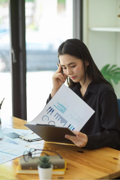 Woman on phone with credit card
